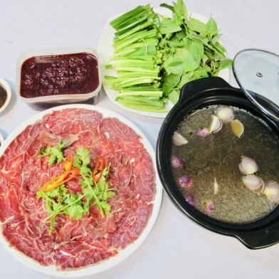 Bắp bò nhúng tiết 